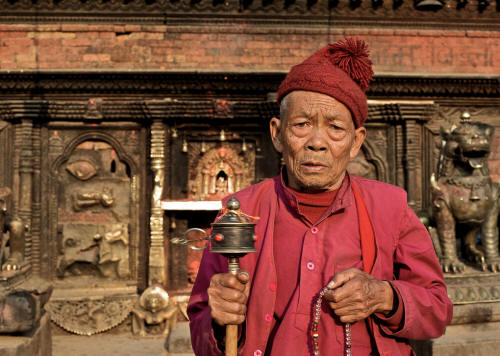 Monk with prayer wheel